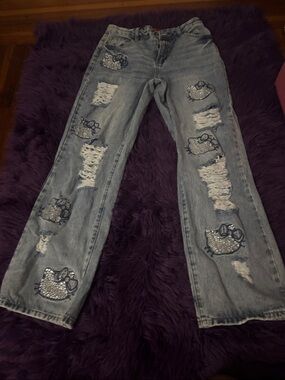 Forever 21 Light Blue Distressed Jeans with Sequin Hello Kitty Patches